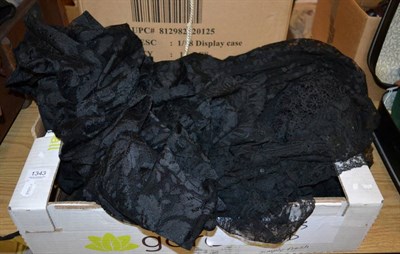 Lot 1343 - Assorted hand and machine made black lace, including shawls, flounces etc (one box)