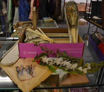 Lot 1360 - Two wooden fans with painted decoration, wooden brisé fan, feather mounted fan, another with gauze