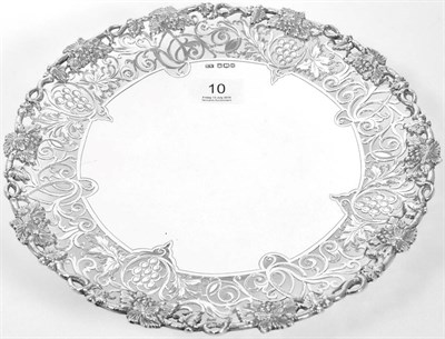 Lot 10 - A silver tazza, Viners Ltd, Sheffield 1955, with fruiting vine rim and pierced scrolling...