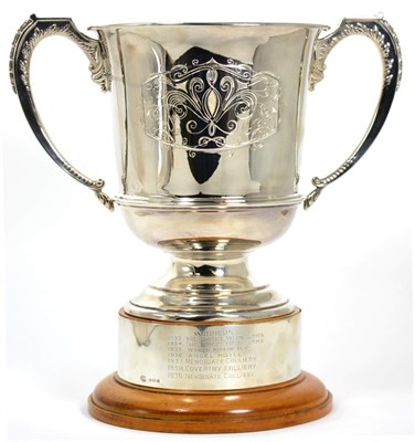 Lot 23 - A large twin handled silver trophy cup, Alexander Clark & Co., Birmingham 1930, the front with...
