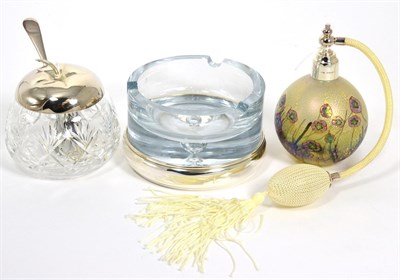 Lot 25 - A Silver mounted iridescent glass perfume atomiser; and silver mounted glass ashtray and a...