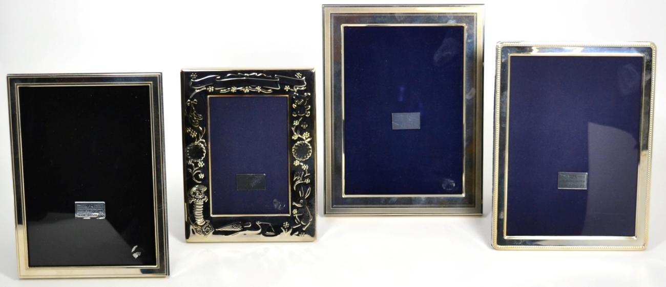 Lot 26 - Four modern rectangular silver photograph frames by Carrs, all as new and boxed, one decorated in a