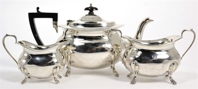 Lot 27 - A Silver three piece tea service, Pearce & Sons, Sheffield 1914, the teapot 25cm long, 23.9ozt (3)