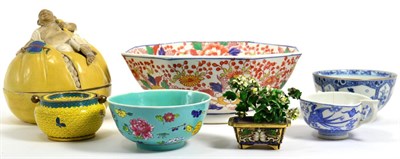 Lot 32 - A mixed quantity of oriental ceramics, Kogo-Hotie on his sack, bowls and a cloisonne flower