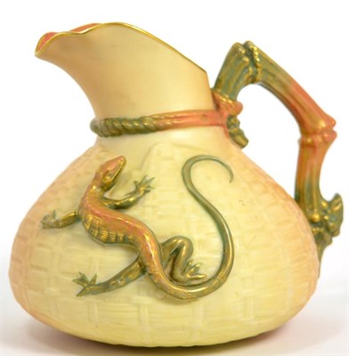 Lot 34 - A Royal Worcester porcelain jug with applied lizard
