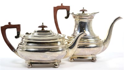 Lot 53 - A silver tea pot and coffee pot, Roberts & Belk, Sheffield 1969, rounded rectangular on ball...
