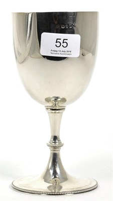 Lot 55 - A Victorian silver goblet, Daniel & Charles Houle, London 1875, plain with bead rims, 17cm high...