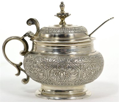 Lot 57 - A Victorian silver mustard pot, George Fox, London 1870, circular and decorated in the Indian...