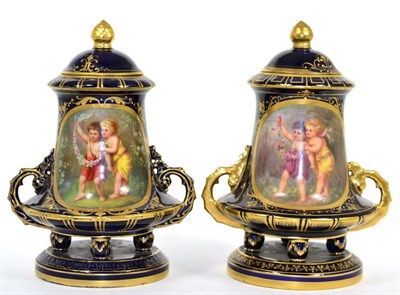 Lot 58 - A matched pair of Vienna twin handled vases and covers