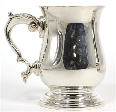 Lot 62 - A modern silver mug of 18th Century style, Camelot Silverware, Sheffield 1998, 13cm high, 9.8ozt