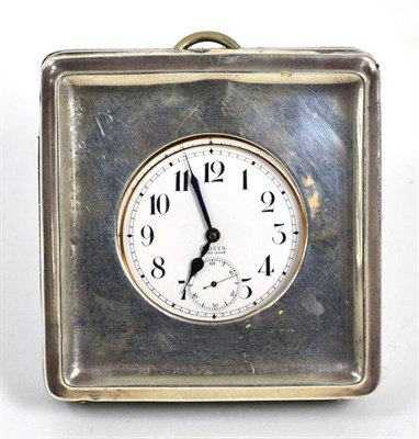 Lot 70 - A plated travelling watch in a silver mounted case