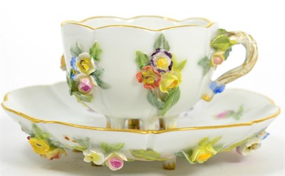 Lot 71 - A Meissen floral encrusted miniature cabinet cup and saucer