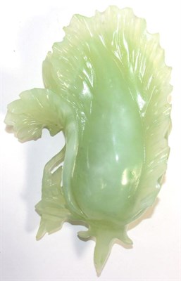 Lot 80 - A Chinese carved jade cabbage leaf, 16cm long