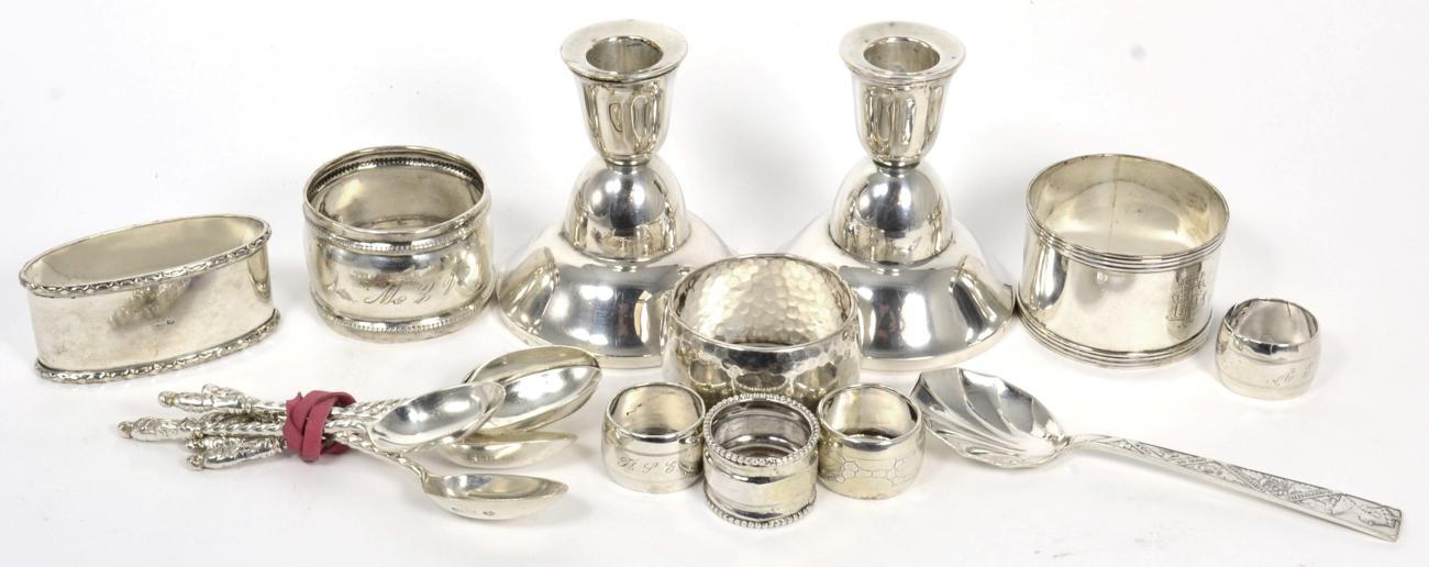 Lot 82 - An assorted group of mostly Dutch silver napkin rings, in both large and small sizes; a pair of...