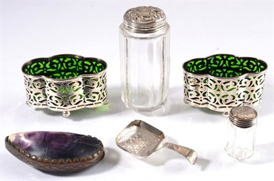 Lot 102 - A Georgian silver caddy spoon; a pair of Chester silver salts; a silver topped jar; a shell...