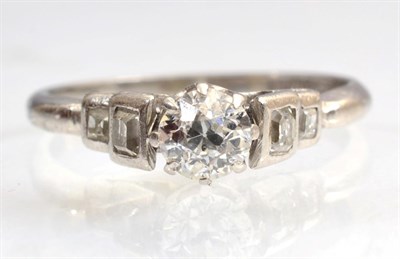 Lot 112 - An Art Deco solitaire diamond ring, an old cut diamond in a claw setting, to square cut diamond set