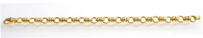 Lot 117 - An 18 carat gold fancy link bracelet, length 18.5cm
