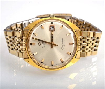 Lot 124 - A plated automatic calendar centre seconds wristwatch, signed Omega, Seamaster, Cosmic