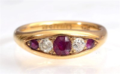 Lot 138 - An 18ct gold diamond and ruby set ring