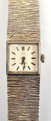 Lot 139 - A lady's 9 carat whit gold wristwatch signed Omega
