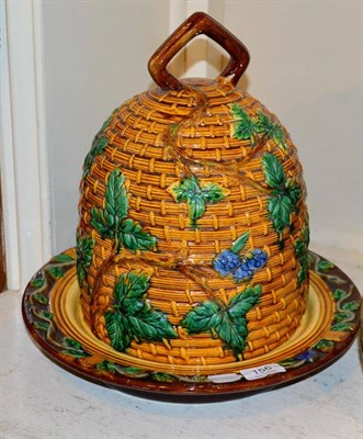Lot 156 - A Majolica cheese dome and stand