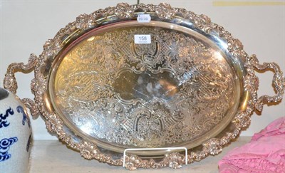Lot 158 - A twin handled electroplated tray, with fruiting vine border