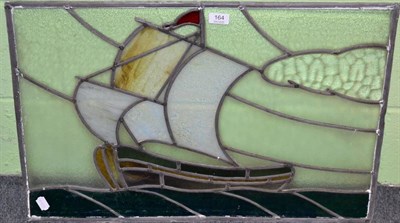 Lot 164 - An Arts & Crafts leaded glass panel of a ship