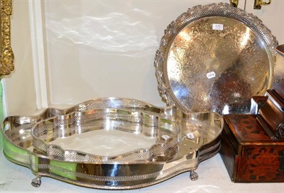 Lot 175 - Three silver plated trays, one tray with vine and floral borders, one twin handled tray with...