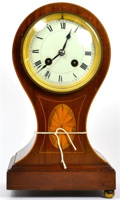 Lot 198 - An Edwardian mahogany inlaid balloon shaped striking mantel clock
