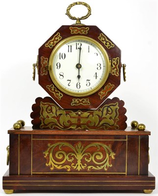 Lot 199 - A brass inlaid mantel clock