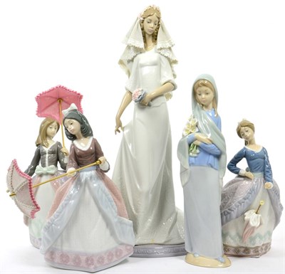 Lot 207 - A group of five Lladro figurines including three girls with umbrellas, a bride and a girl...
