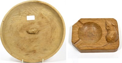 Lot 217 - A Robert ";Mouseman"; Thompson oak bread board, with carved mouse signature, 31cm; and A Robert...