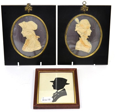 Lot 221 - A pair of 20th century wax relief portraits by Leslie Ray of a lady and gentleman in period costume