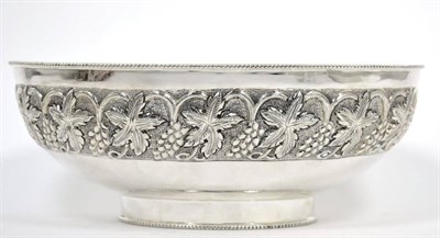 Lot 224 - A modern silver bowl, C J Vander, Sheffield 2005, oval with bead border and repousse fruiting...
