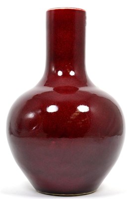 Lot 228 - A Chinese sang-de-boeuf bottle vase, 33cm high