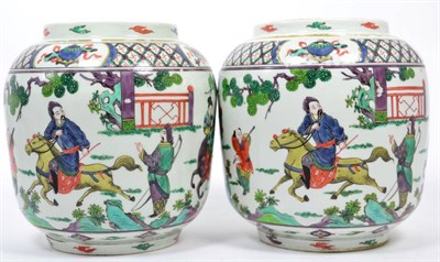 Lot 239 - A pair of Chinese famille verte figural design jars, 19cm high (2)