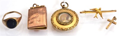 Lot 247 - An early 19th century mourning pendant, a central glazed locket containing hairwork, within a...