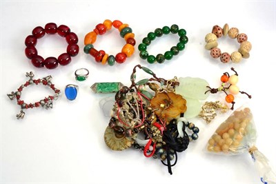 Lot 253 - A quantity of Chinese costume jewellery including wooden bead necklaces etc