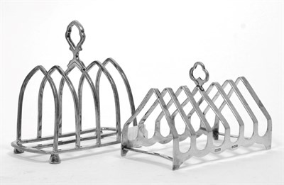 Lot 309 - A silver toast rack, Sheffield 1920; and another example Birmingham 1938, the larger 11.5cm...