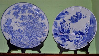 Lot 336 - Two Oriental blue and white chargers