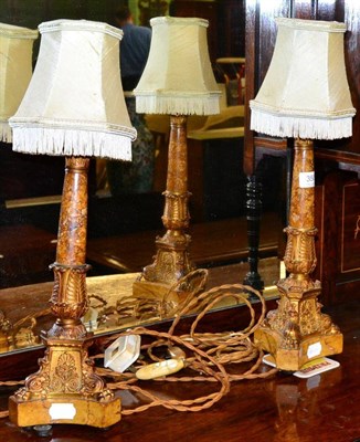 Lot 350 - A pair of 19th century ormolu and marble candlesticks, (now converted to electric table lamps) both