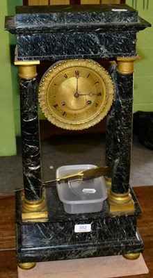 Lot 352 - A green marble portico striking mantel clock, second half of the 19th century