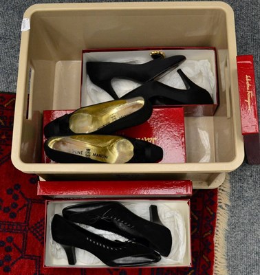 Lot 1004 - Four pairs of black designer court shoes, comprising a pair of Casadei pointed toe stiletto...