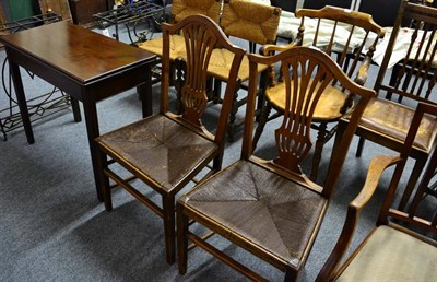 Lot 1121 - Two pairs of rush seated chairs and a 19th century fold over table