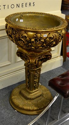 Lot 1132 - A composition gilt font