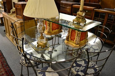 Lot 1143 - A modern painted and gilt twin pillar glass topped coffee table and a gilt metal mounted cut...