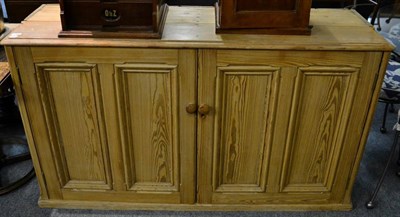 Lot 1148 - A pine low cupboard