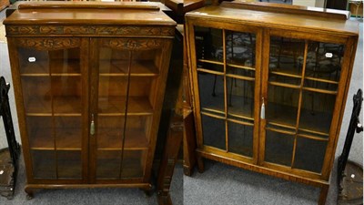 Lot 1154 - Two 1920's oak glazed bookcases