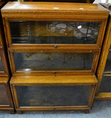 Lot 1155 - A Globe-Wernicka oak three tier bookcase