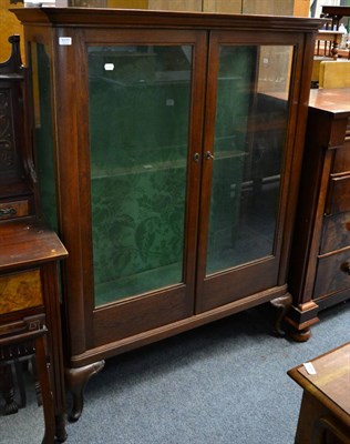 Lot 1177 - A large glazed oak display cabinet